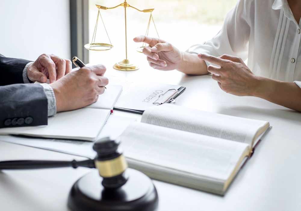 lawyer sharing legal advice with criminal defence client